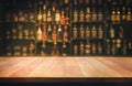 Empty the top of wooden table with blurred counter bar Royalty Free Stock Photo