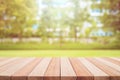 Empty top wooden table and sunny abstract blurred bokeh background Royalty Free Stock Photo