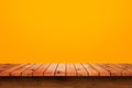 Empty top of wooden table on yellow background. Royalty Free Stock Photo