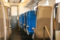 Empty train interior. Corridor and a lot of seats. Royalty Free Stock Photo