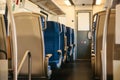 Empty train interior. Corridor and a lot of seats. Royalty Free Stock Photo