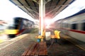 Empty train station with fast moving trains