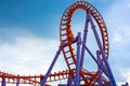 Empty tram rails or loop Roller Coaster with blue sky in amusement park Royalty Free Stock Photo