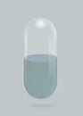 Empty transparent capsule pill isolated on gray background