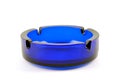 Empty transparent dark blue ashtray