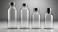 Empty Transparent Glass Bottles with Silver Caps on Gray Background Royalty Free Stock Photo