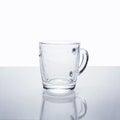 Empty transparent glass mug with water drops Royalty Free Stock Photo