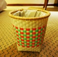 Empty trash bin on floor of bedroom Royalty Free Stock Photo