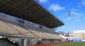 Empty tribunes on soccer stadium Royalty Free Stock Photo