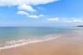 Empty tropical beach and sea with white cloud and blue sky background Royalty Free Stock Photo