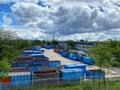Empty truck containers and trailers ready to collect garbage and junk Royalty Free Stock Photo