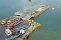 Empty trucks and lorries parked on a loading pier of container terminal in Puerto Barrios .