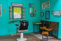 Empty turquoise hair salon and barber shop interior Bangkok Thailand