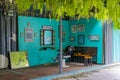 Empty turquoise hair salon and barber shop interior Bangkok Thailand