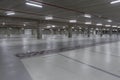 Empty underground car park illuminated at night Royalty Free Stock Photo