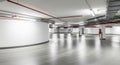 Empty Underground Parking Garage With Curved White Walls And Industrial Lighting interior Royalty Free Stock Photo