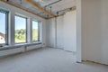 Empty unfurnished room with minimal preparatory repairs. interior with white walls and drywall