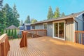 Empty walkout deck with redwood railings