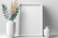 Empty vertical frame mockup in modern minimalist interior with plant in trendy vase on white wall background Royalty Free Stock Photo