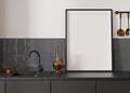 Empty vertical picture frame standing in modern kitchen. Mock up interior in minimalist, contemporary style. Free, copy Royalty Free Stock Photo