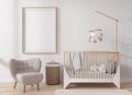 Empty vertical picture frame on white wall in modern child room. Mock up interior in scandinavian style. Free, copy