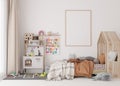 Empty vertical picture frame on white wall in modern child room. Mock up interior in scandinavian style. Free, copy