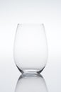 Empty vine glass on gradient background Royalty Free Stock Photo