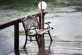 Empty vintage bench under rain. Autumn Royalty Free Stock Photo