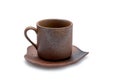 Empty vintage brown ceramic mug nature design with coaster Royalty Free Stock Photo