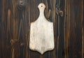 Empty vintage cutting board on wooden background Royalty Free Stock Photo