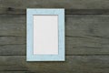 Empty Vintage photo frame on old wood background Royalty Free Stock Photo