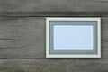 Empty Vintage photo frame on old wood background Royalty Free Stock Photo