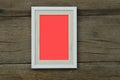 Empty vintage photo frame placed on old wood background Royalty Free Stock Photo