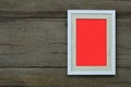 Empty vintage photo frame placed on old wood background Royalty Free Stock Photo