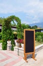 Empty Vintage slake next to open air restaurant terrace in Budva, Montenegro. Royalty Free Stock Photo