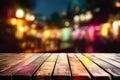 empty vintage wooden terrace with colorful abstract night light bokeh of night festival with copy space Royalty Free Stock Photo