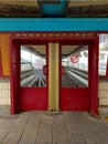 Empty waiting area on platform at the station Royalty Free Stock Photo