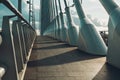 An empty walk path on a modern steel and white concrete bridge Royalty Free Stock Photo