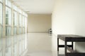 Empty walkway in building hall perspective with long white wall Royalty Free Stock Photo