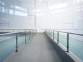 Empty walkway with glass barrier Royalty Free Stock Photo