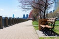 Empty Walkway on the Waterfront of Roosevelt Island with Benches during Spring in New York City