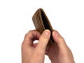 An Empty wallet in the hands of a man  on white background, wealth Royalty Free Stock Photo