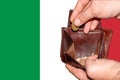 Empty wallet shows the global financial economic crisis triggered by the corona virus in Italy Royalty Free Stock Photo