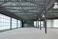 Meeting of group of builders and architects in empty warehouse.