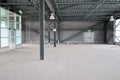 Empty warehouse under construction with natural light. Royalty Free Stock Photo