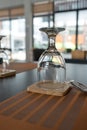 Empty water glasses upside down on the table Royalty Free Stock Photo