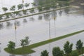 Empty wet parking lot in summer Royalty Free Stock Photo