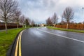 Empty wet street on a cloudy winter day Royalty Free Stock Photo