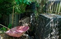 An empty wheelbarrow is waiting to be filled with compost