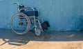 Empty wheelchair at accessible pool